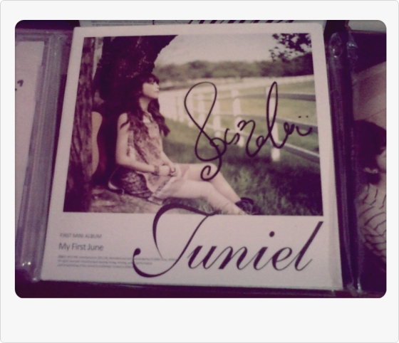 juniel signed CD